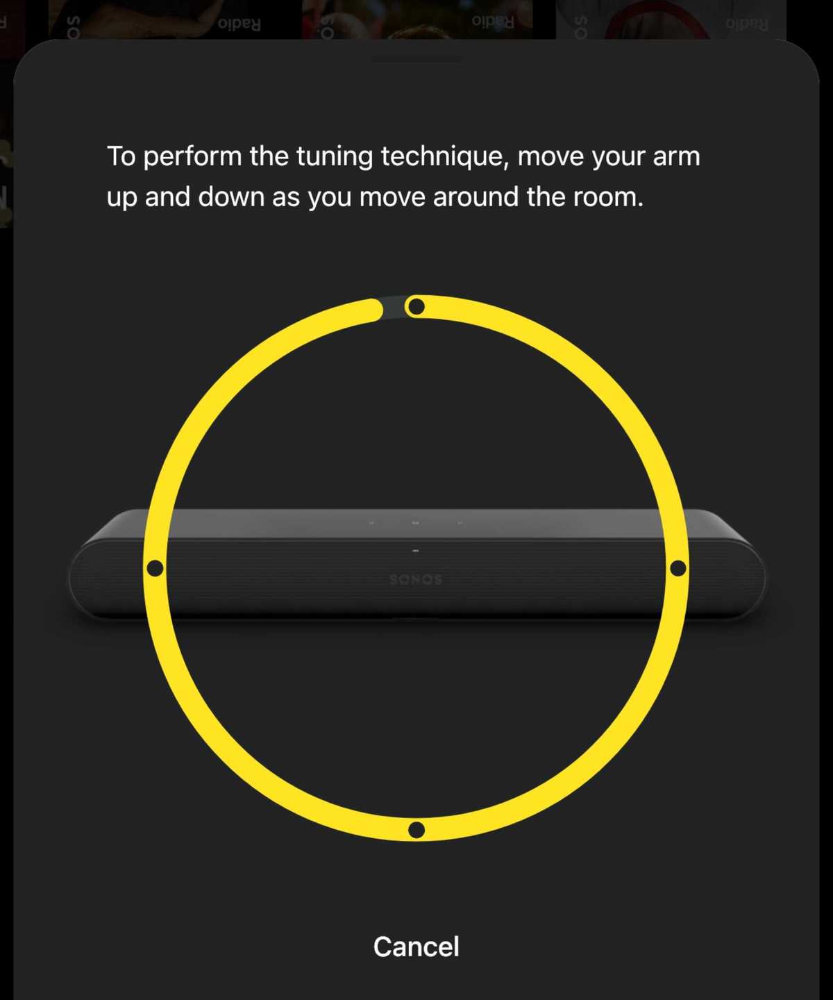 Screenshot of the Sonos app setting up Trueplay for the Sonos Ray soundbar, showing instructions involving moving arm up and down while moving around the room.