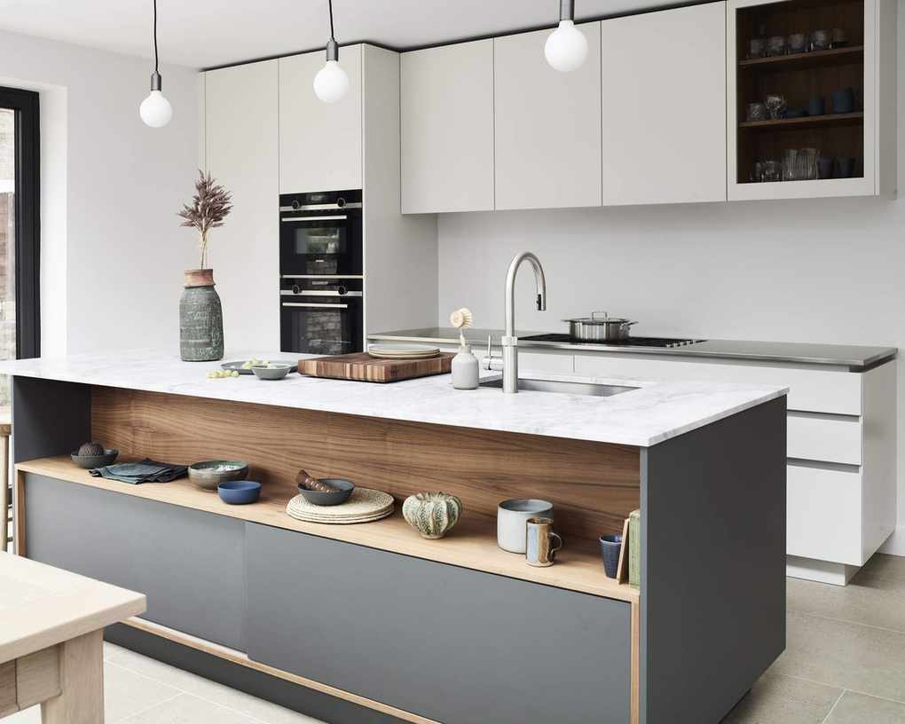 Chic white kitchen with handleless cabinetry