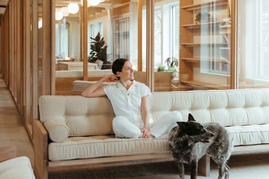 Adriene Mishler relaxing on her couch in Austin.