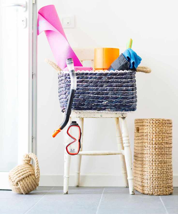 Toys in box on chair