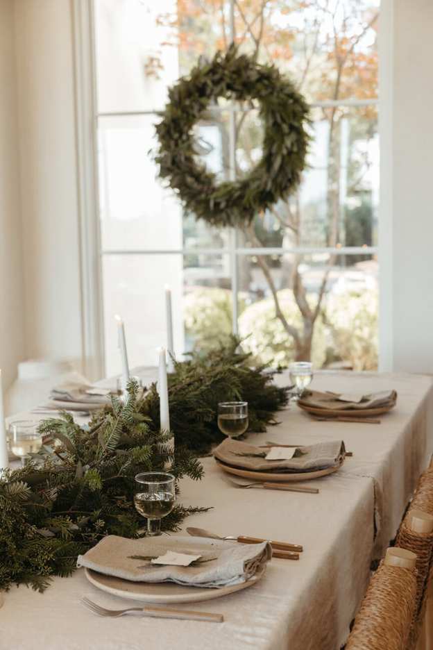 Holiday table with evergreen runner