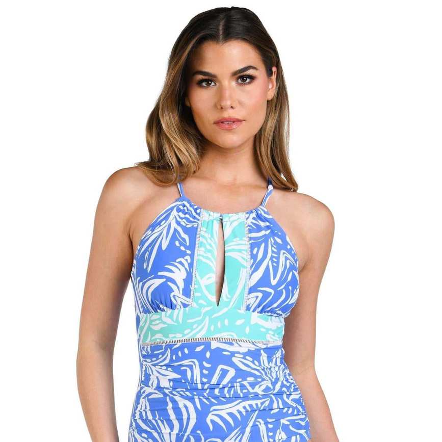 Woman in a blue high-neck swimsuit