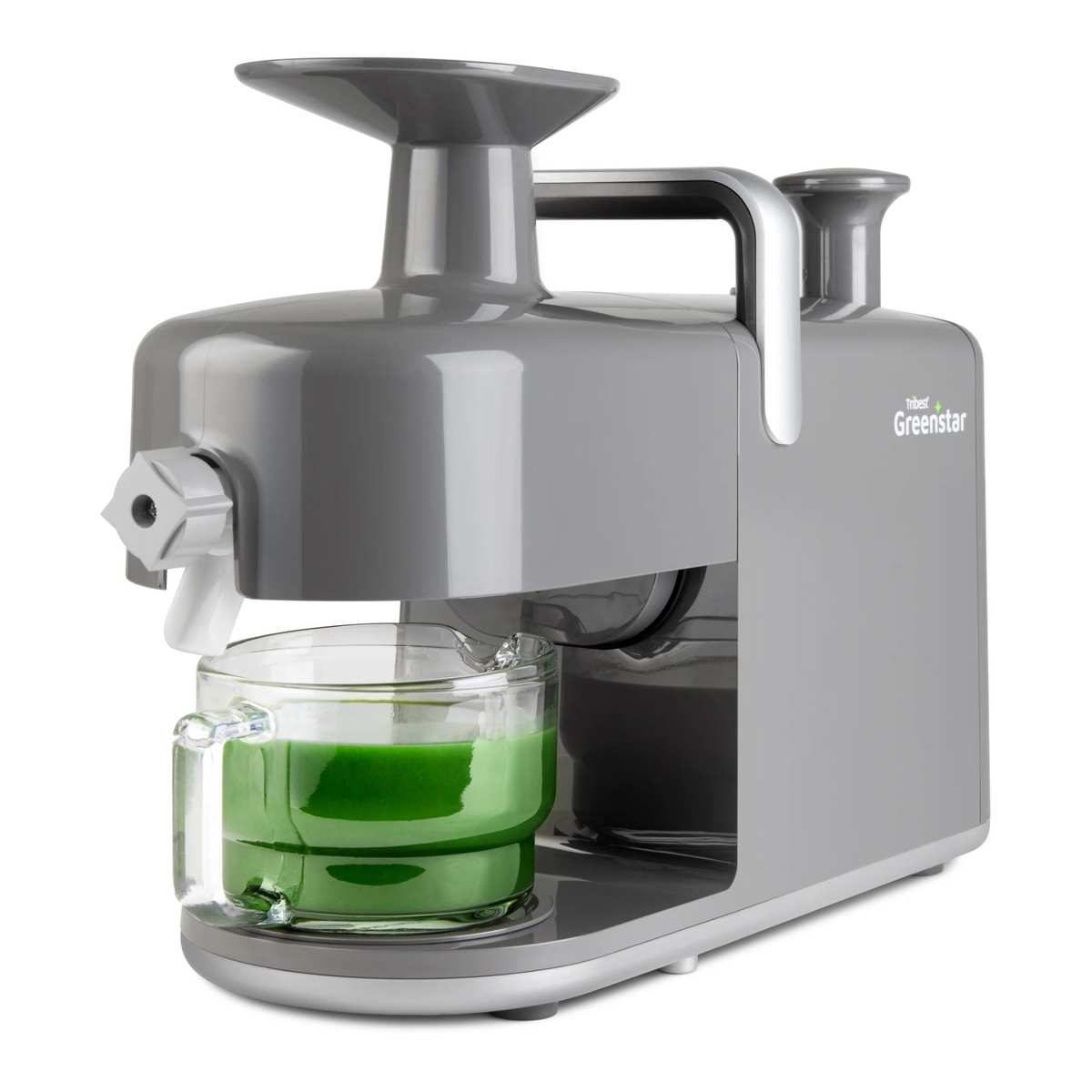 A Tribest Greenstar 5 Juicer making green juice