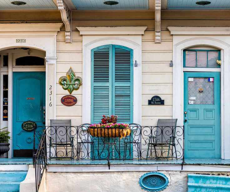 Shotgun house with blue accents