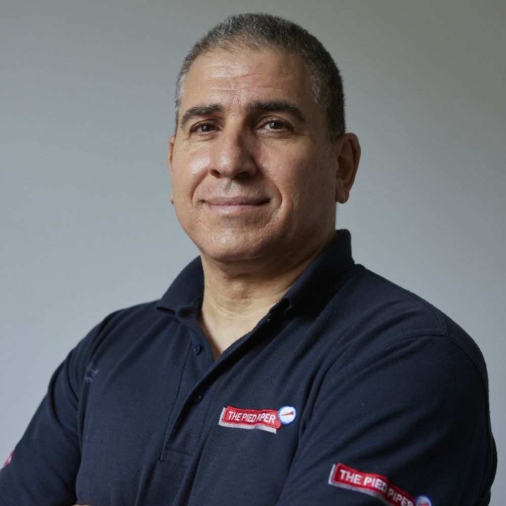 A headshot of Tony King
