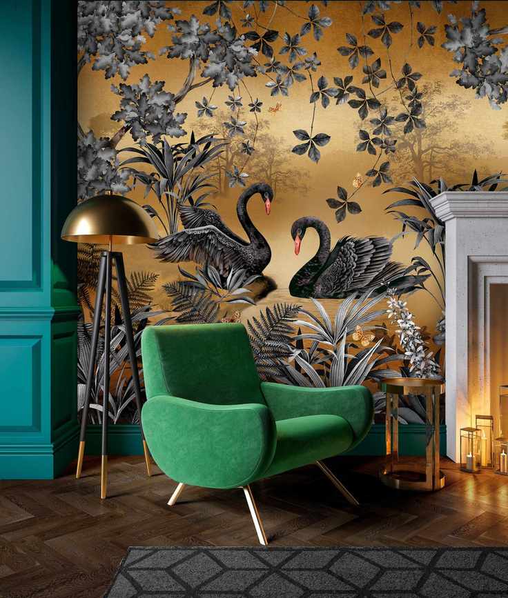 Mural wallpaper with black swans next to fireplace with armchair in front