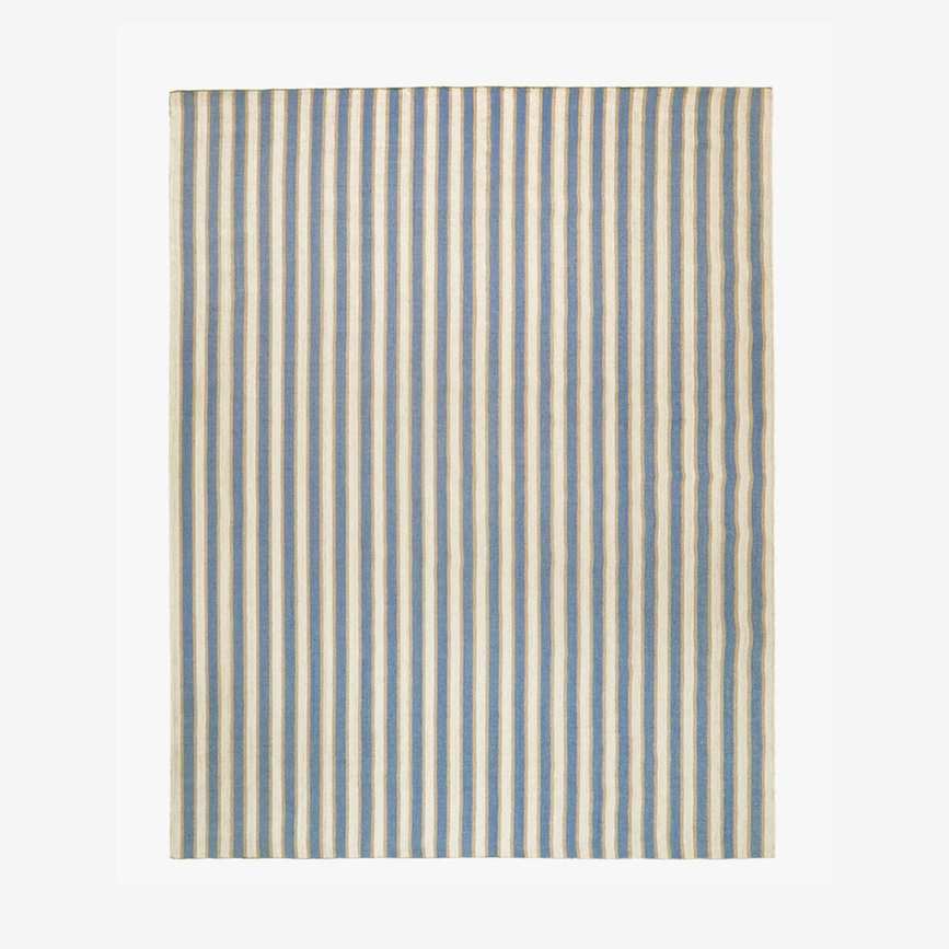 Blue, white and red striped outdoor rug