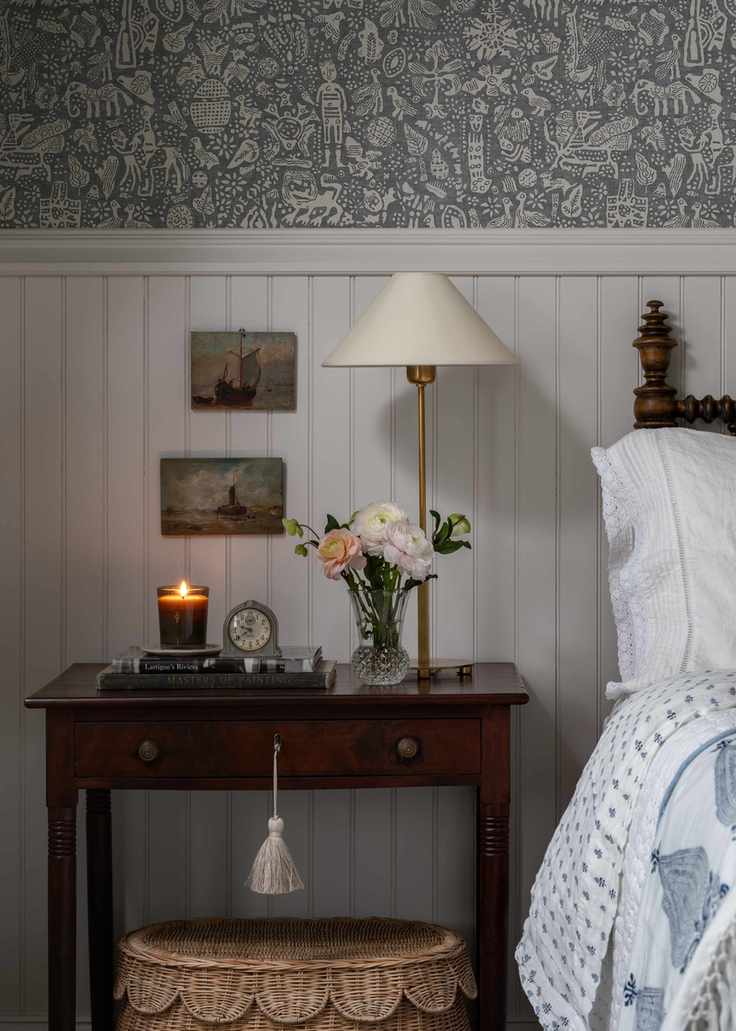 Cozy bedroom with walnut nightstand and rattan dresser