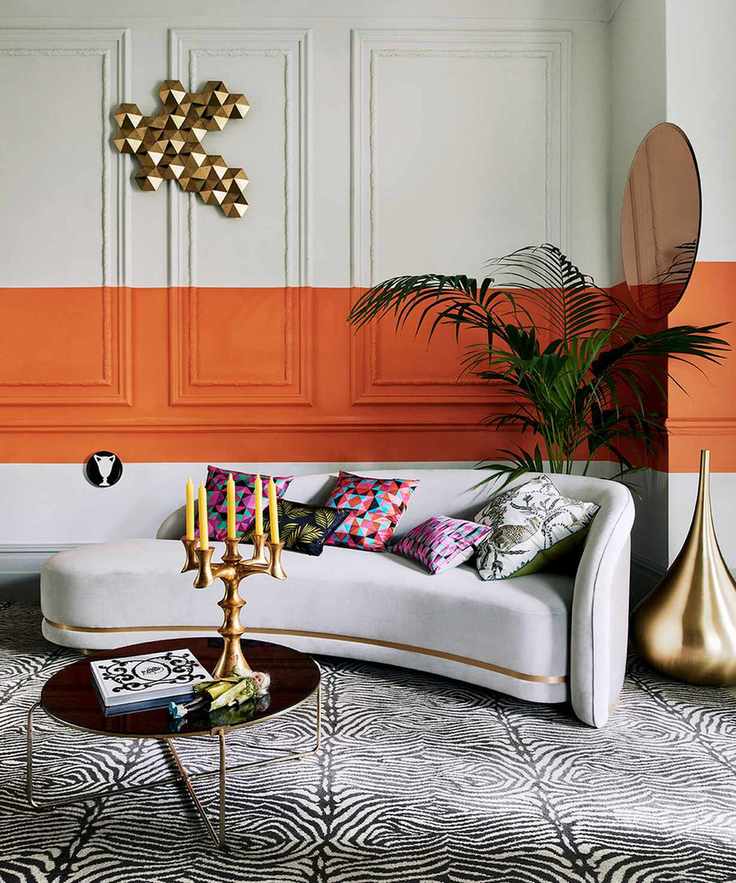 Living room with grey walls and a bright orange stripe