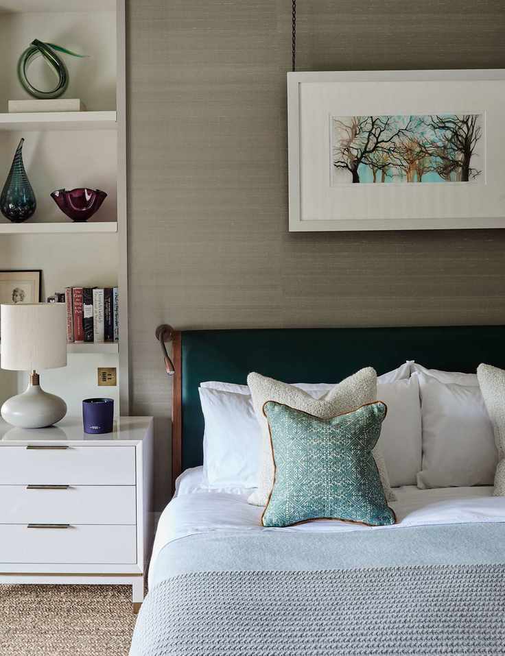 Grey bedroom with green accents