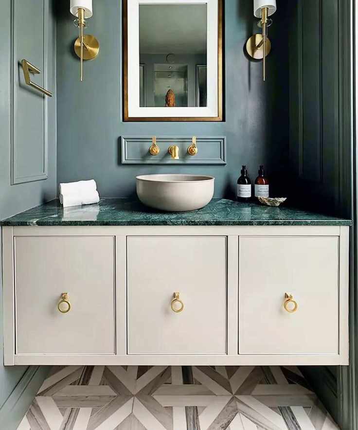White vanity unit with green countertop