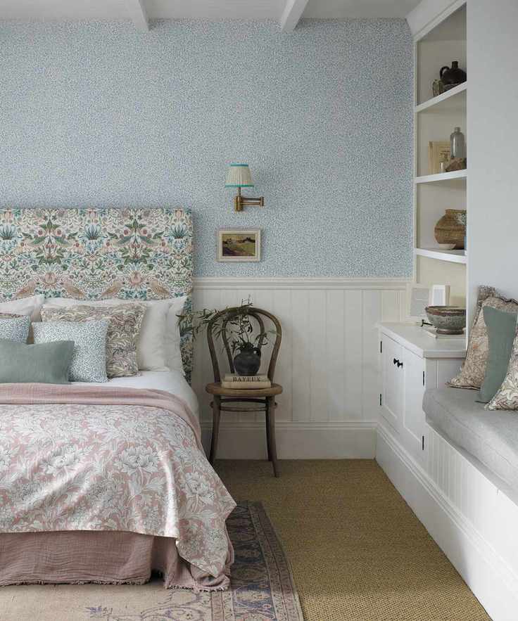 White painted bedroom with minimal artwork