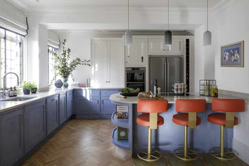 Kitchen with red bar stools
