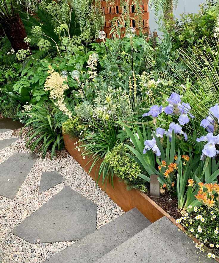 path with lighting and paving in Kate Gould design