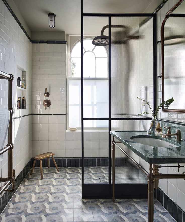 Luxury walk-in shower with unique ceiling light