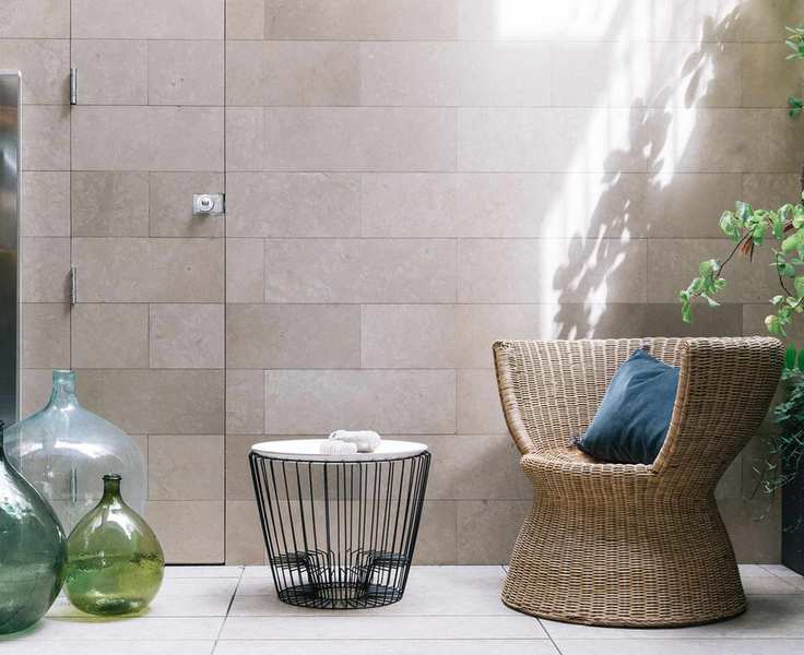 Continuous tiling creates a light and airy feel