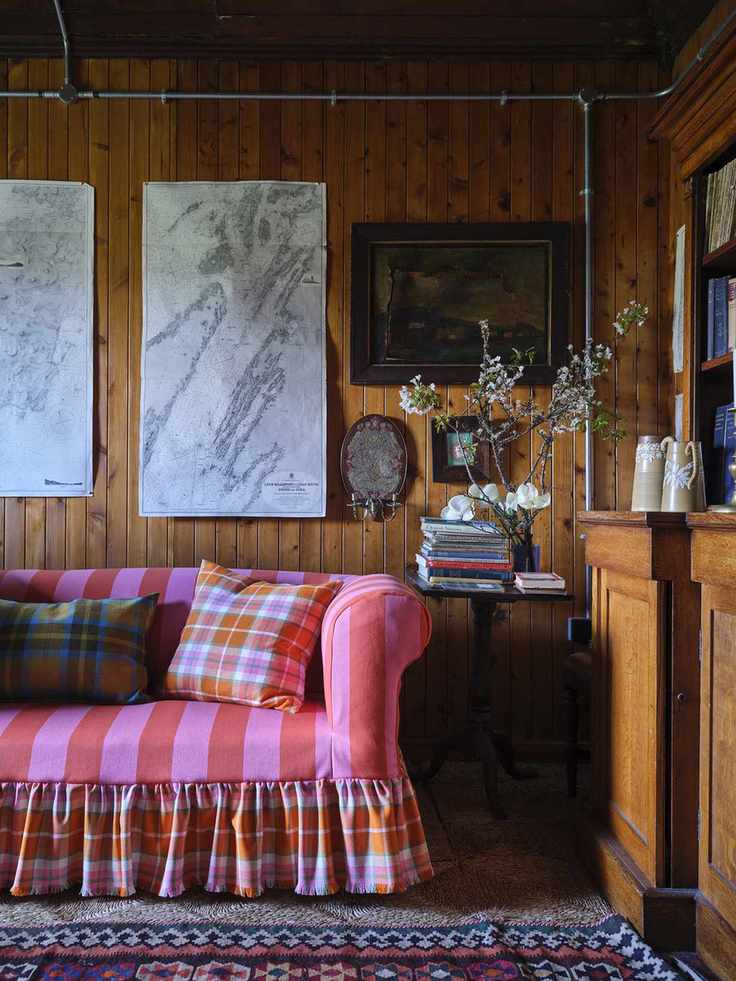 Vibrant sofa with tartan skirt and cushions by Johnstons of Elgin & Ben Pentreath
