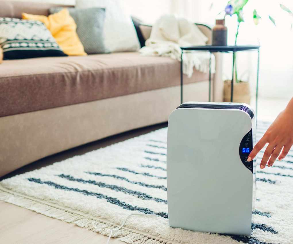 A dehumidifier in a living room