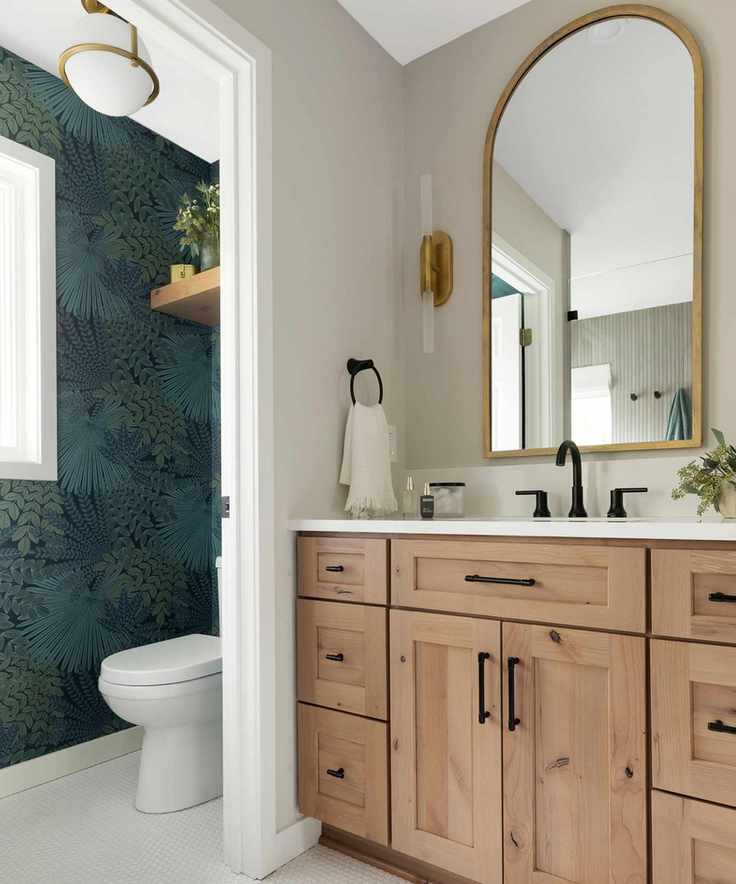 A modern bathroom with Canvas Tan painted walls and stylish fixtures.