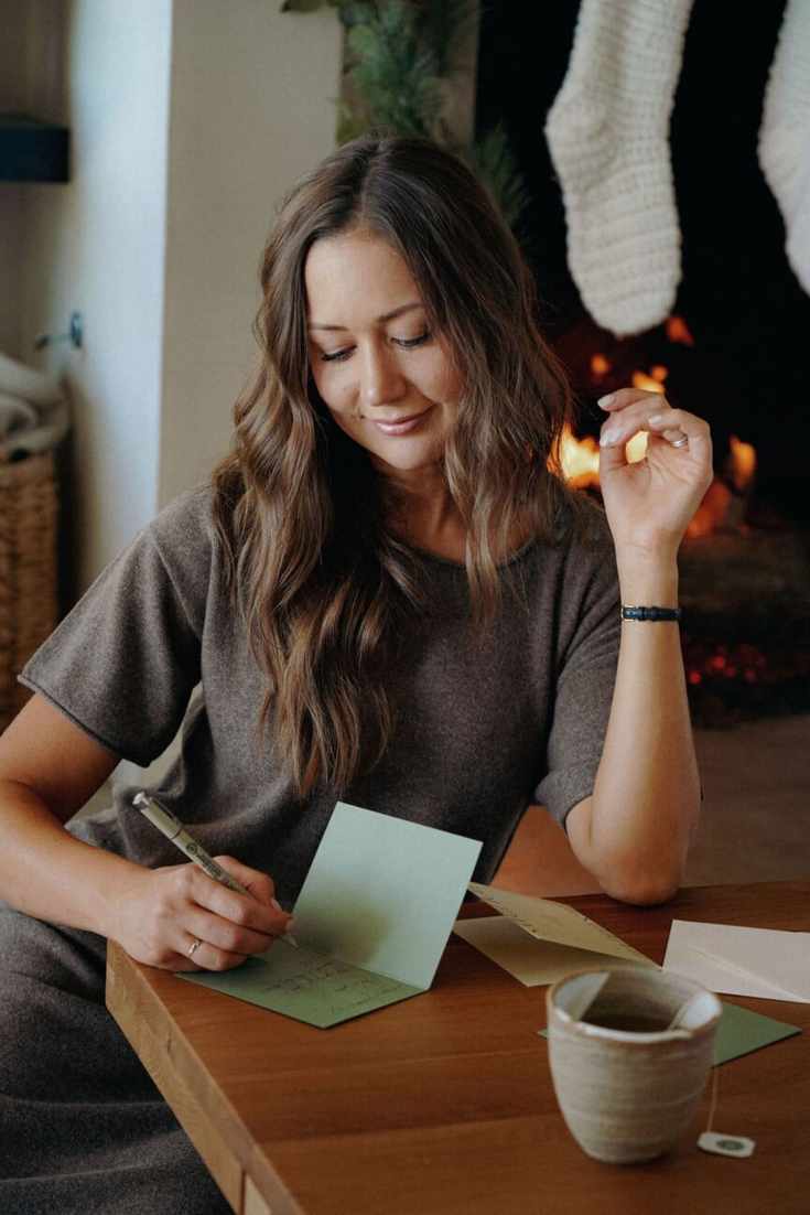 Camille Styles writing holiday cards_holiday boundaries