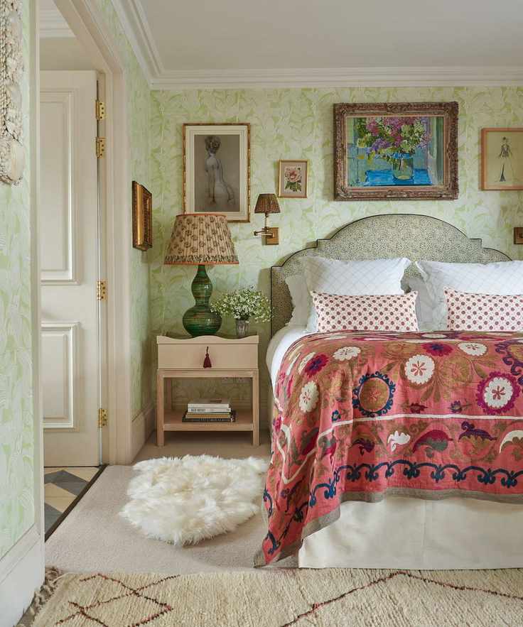 Bedroom designed by a Sarah Vanrenen with a vintage suzani bedspread