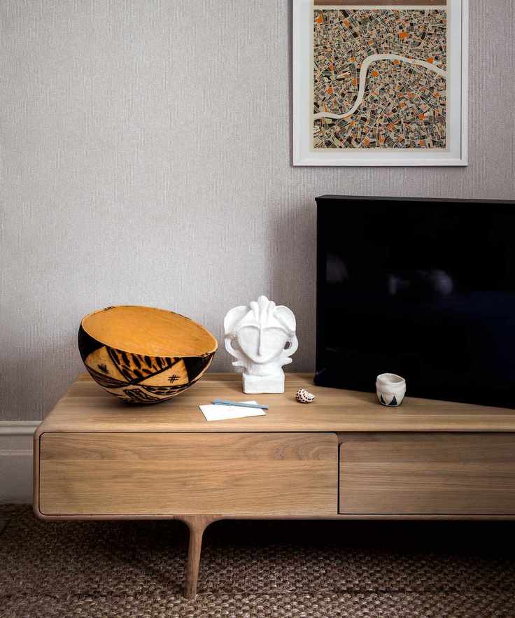 Grey living room with wooden tv stand