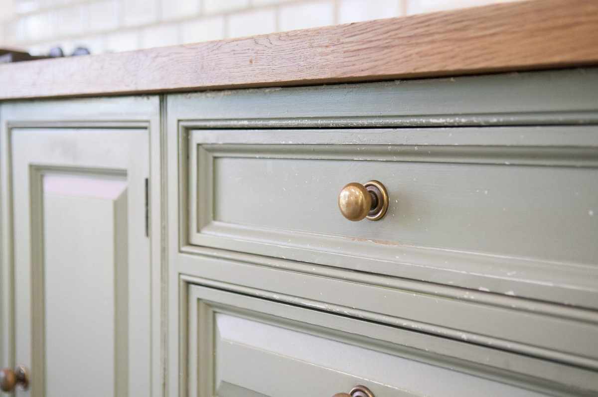 Updating kitchen cabinet with new handles