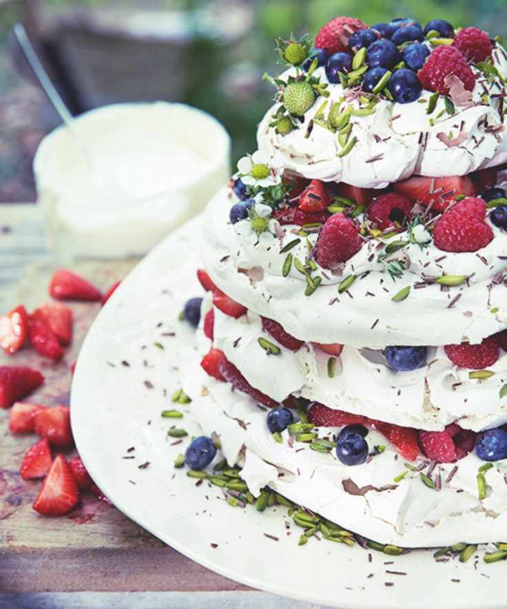 Meringue stack topped with fresh summer berries