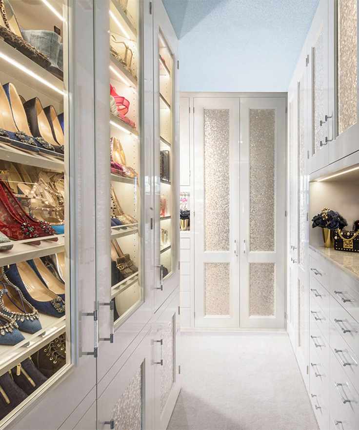 Walk-in closet with shoe storage and drawers