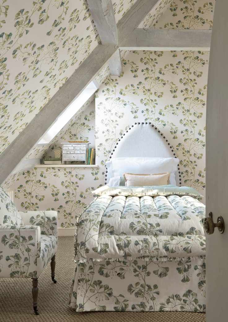 Cottage bedroom ideas featuring leafy prints by Colefax and Fowler