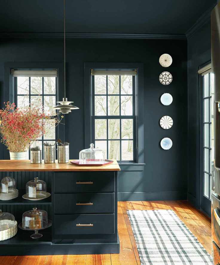 Gothic style kitchen painted dark green