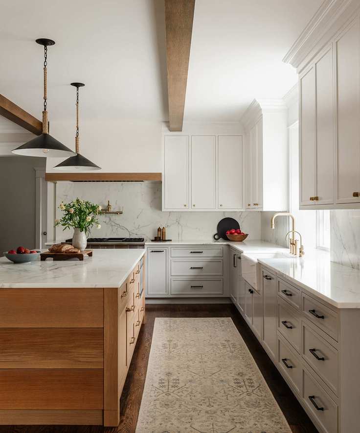 Modern rustic kitchen with cream cabinets and wood island