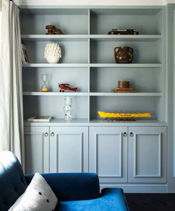 blue living room shelving and couch