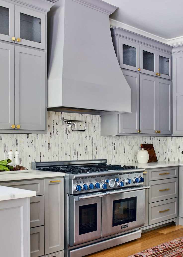 Oversized extractor hood in traditional kitchen