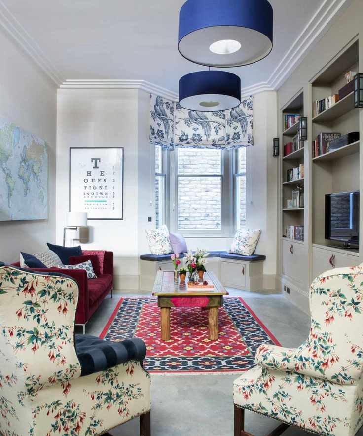 A bright living room with various patterns and colors
