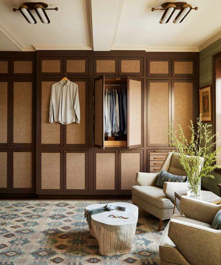 Dressing room with wooden doors on closet