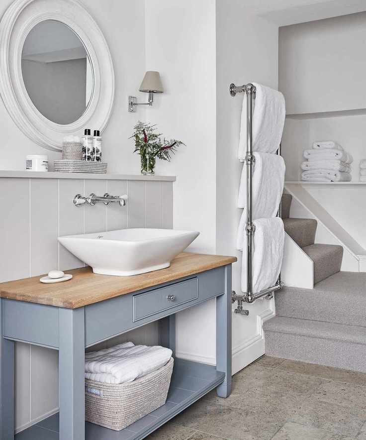 Calming bathroom with organized towel storage