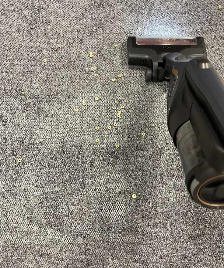 Miele Triflex HX2 Pro vacuuming cereal and lentils on carpet