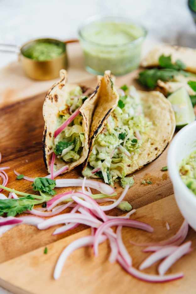 chimichurri fish tacos standing up
