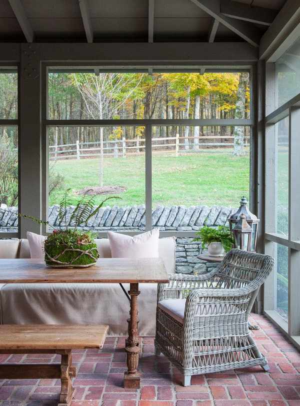 sunroom with brick floor and patio furniture