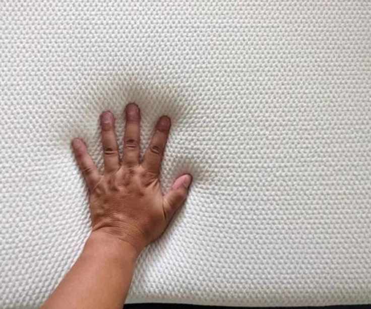 Pressing into the mattress