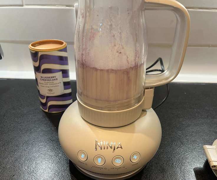 Pre-blending a blueberry milkshake.