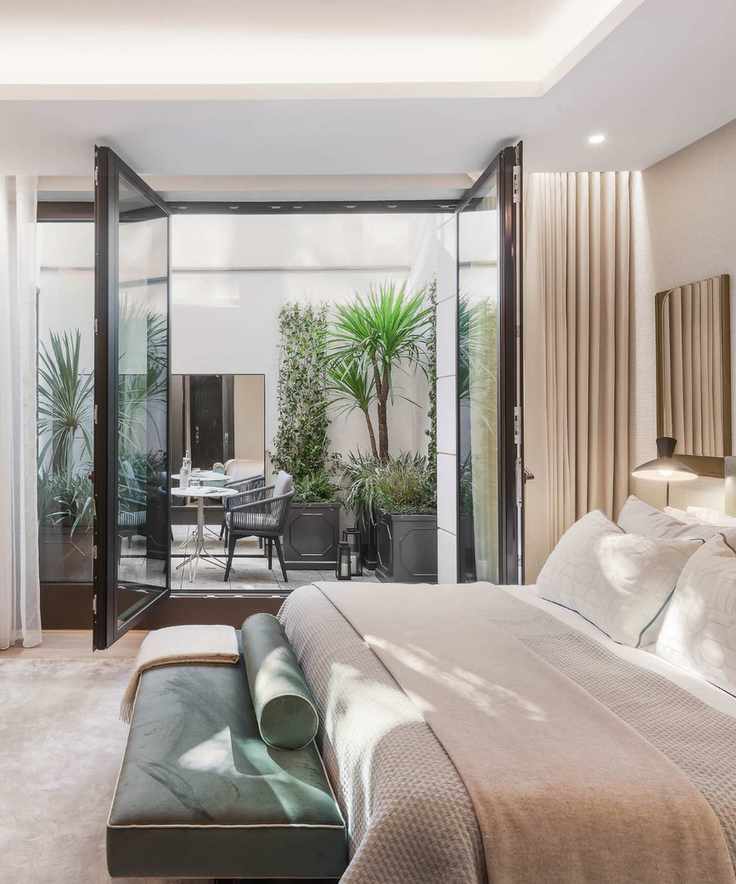 Bright bedroom with an outdoor terrace