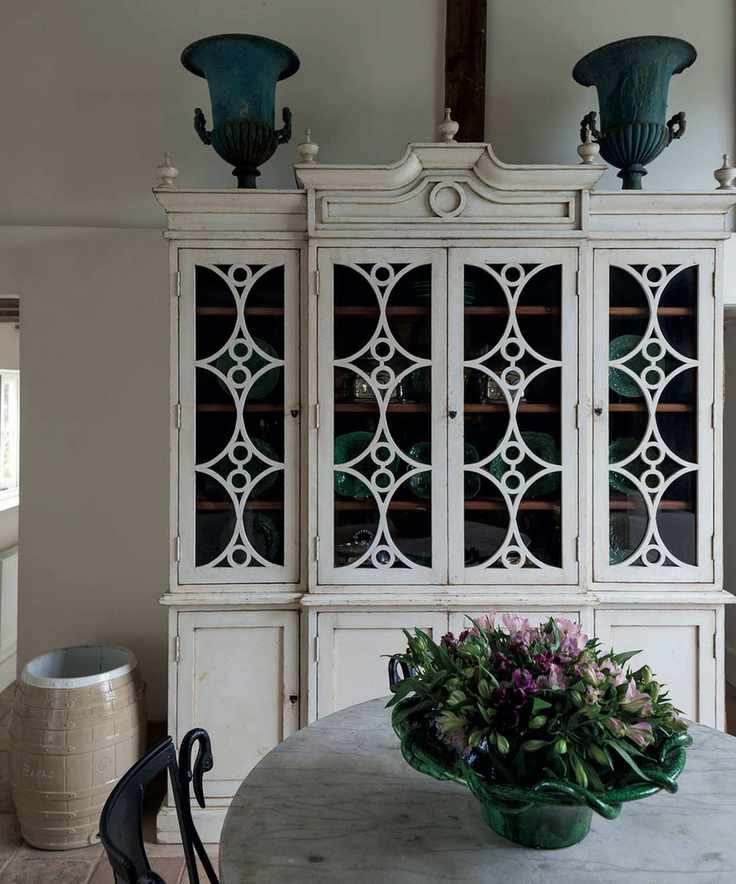 Ornate dresser and dining table with chair