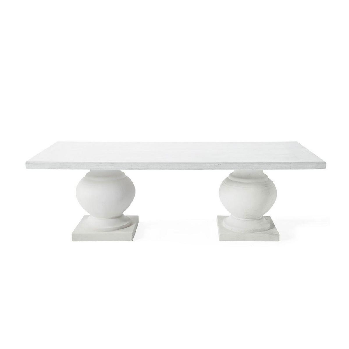 Stone dining table with sculptural legs