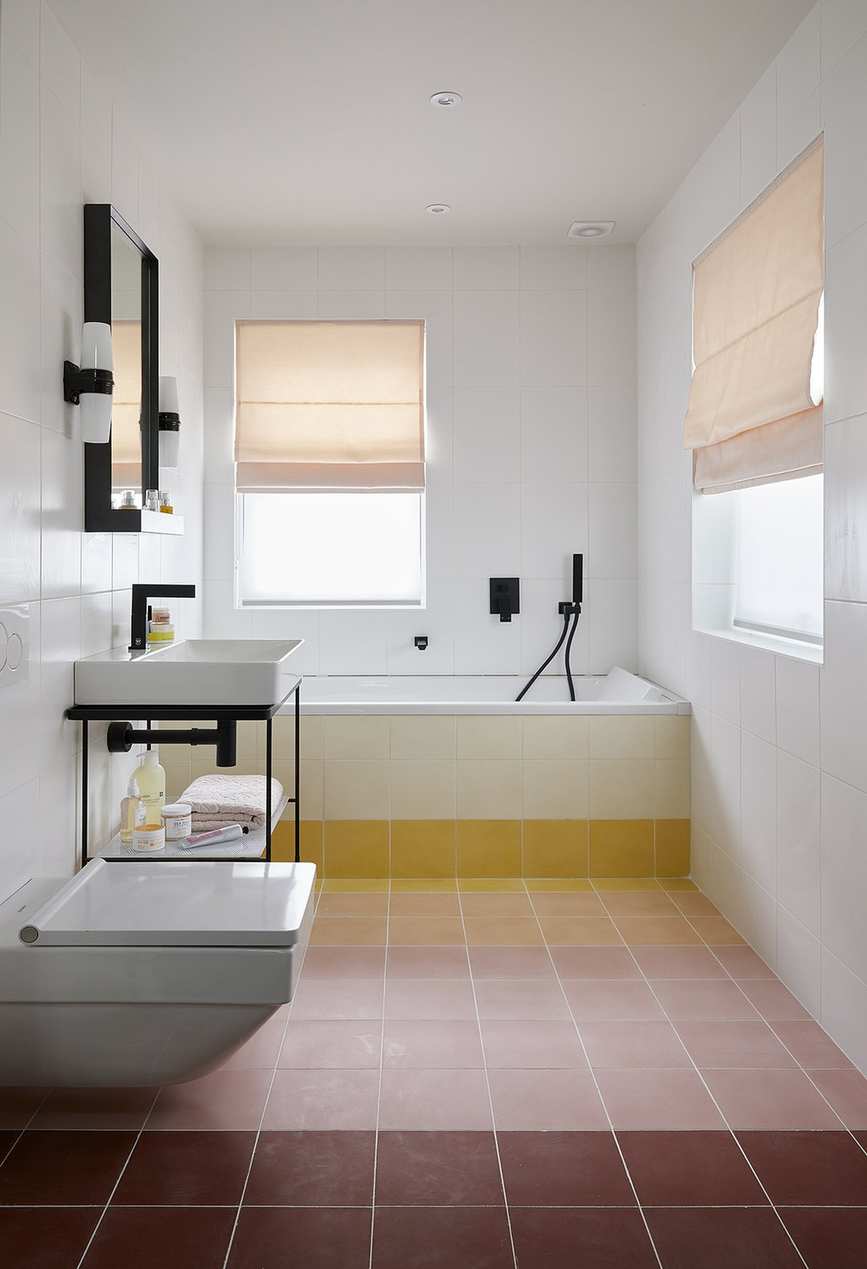 Small bathroom featuring sunset tiles