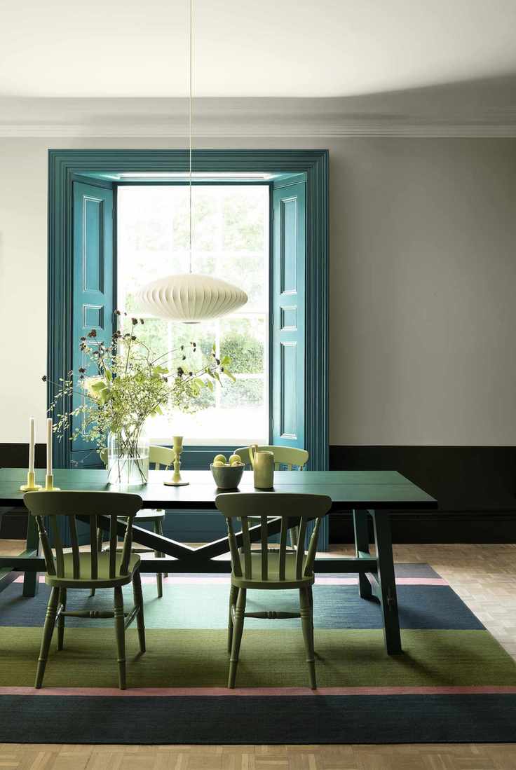 Window shutters painted in teal