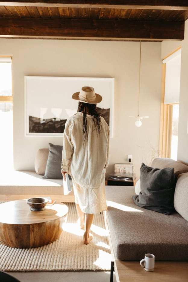 Woman walking in living room