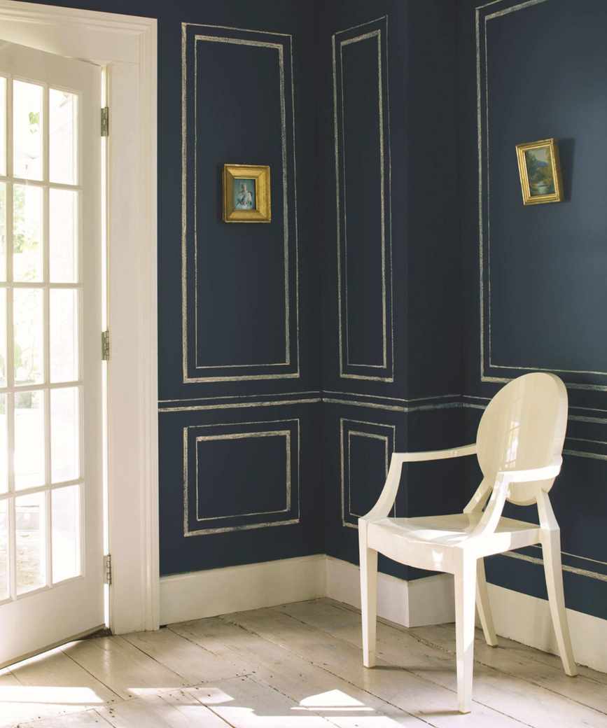 Hallway with navy blue and gold paneling effect