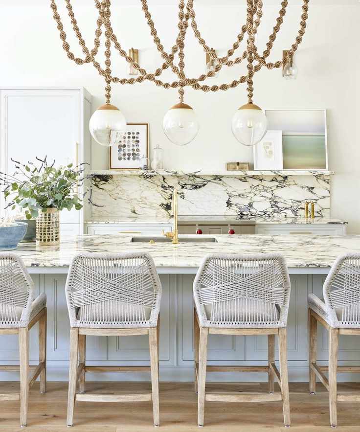 blue and white kitchen with massive lights